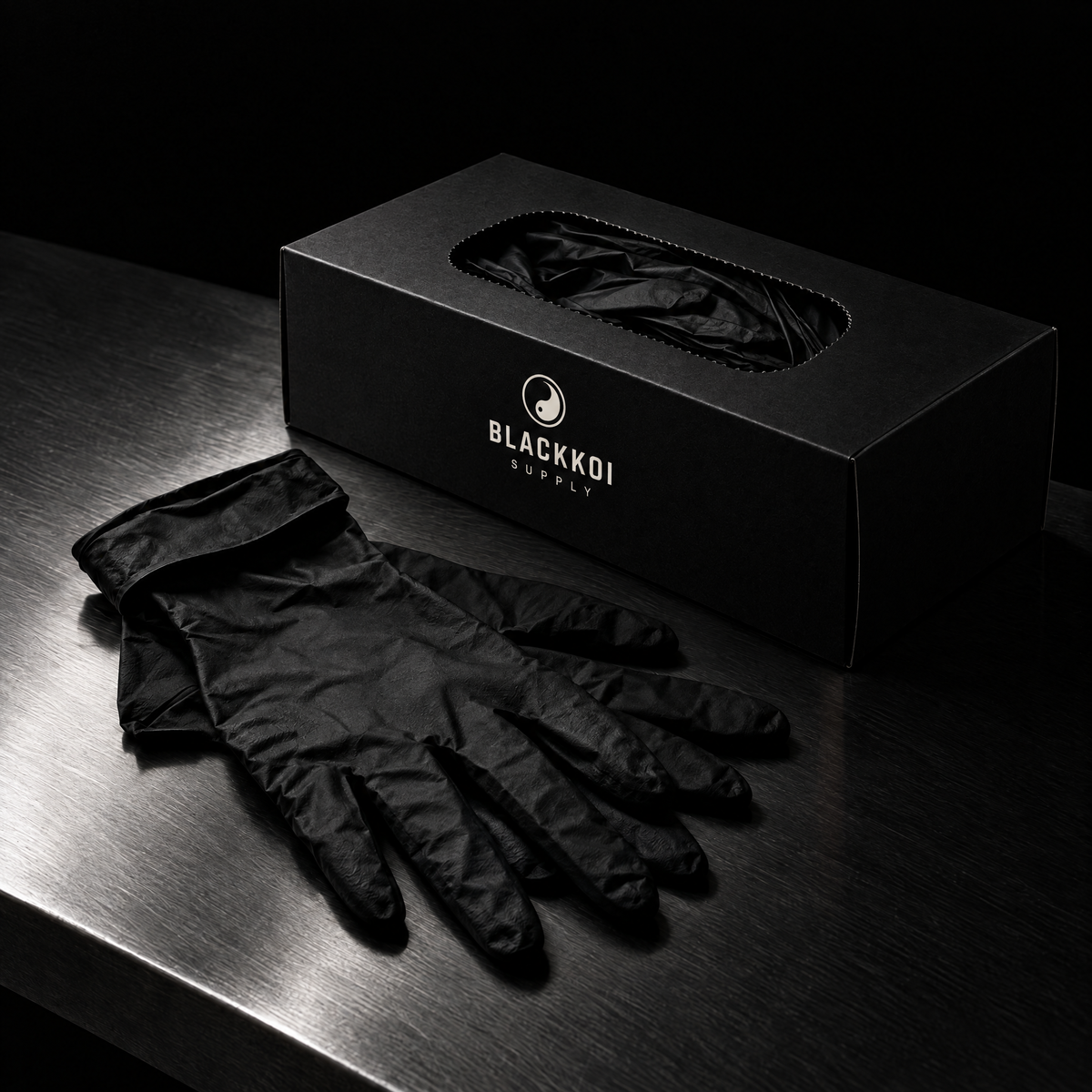 Black nitrile gloves with the BlackKoi Supply dispenser box