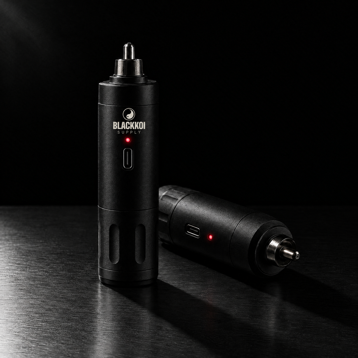 Wireless battery with the BlackKoi Supply mark, two units